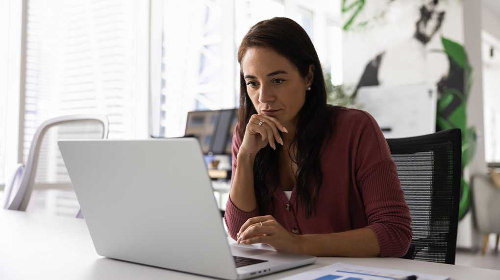 woman-thinking-at-laptop